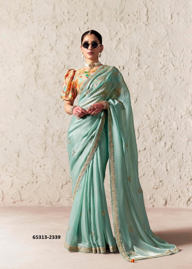 Alluring light blue sari with floral blouse