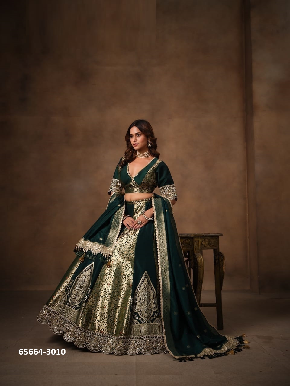 Feel Royal in this Hunter green Lahenga Choli With dupatta